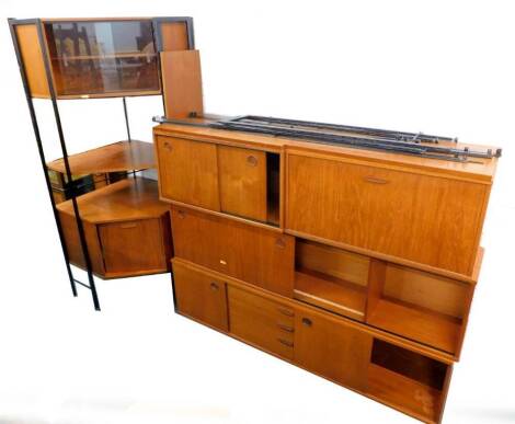 A collection of 1960s/70s teak Ladderax type wall units, to include a corner section etc.