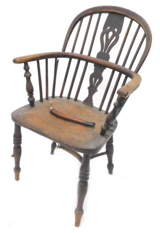 A 19thC yew ash and elm Windsor chair, with a solid seat on turned legs with crinoline stretcher, (AF)