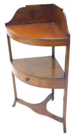 A 19thC corner mahogany washstand, with a raised back above a plain later fitted top, the under tier with a central drawer on splayed legs, 55cm W.