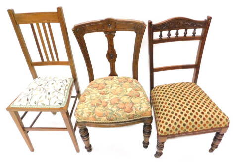 Three late 19th/early 20thC chairs, to include a Victorian oak nursing chair with padded seat, an Edwardian walnut nursing chair with padded seat and an Edwardian bedroom chair.