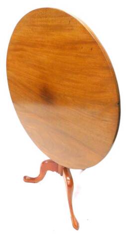 A mahogany tilt top breakfast table, with a circular top, and turned column with tripod base, 83cm dia.