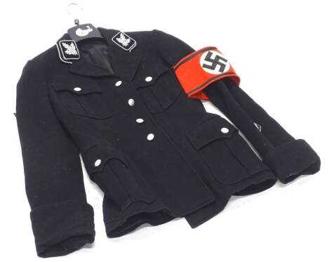 A German Third Reich style jacket, with woven silver oak leaf badges, a Nazi party arm band etc.