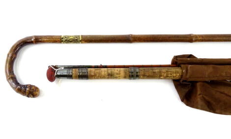 A Victorian bamboo and gilt metal sword stick, and a split Cane fishing rod. (2)