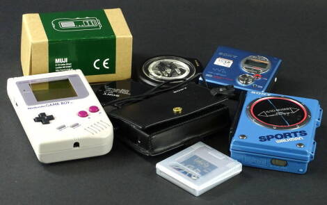 A retro Nintendo Gameboy, with Tetris game, a Sony MZ-R410 walkman, a Sony sports Walkman, Muji wind up radio etc. (1 box)