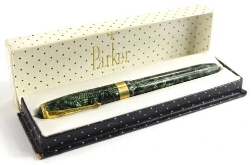 A fountain pen, with gilt metal mounts in original case, 15cm L overall.