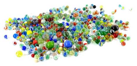 A large quantity of coloured marbles, various sizes etc.