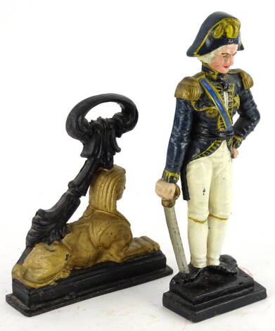 Two cast iron door stops, one modelling the form of Lord Nelson, the other a sphinx.