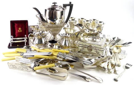 A large quantity of silver plate, to include a sardine dish, sauce boats, pair of mother of pearl and silver plated knife rest, cutlery, egg cruet, etc.