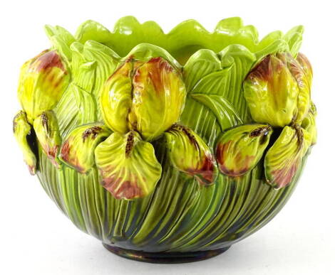 A Bretby pottery jardiniere, moulded in relief with tulips (AF), 26cm W.