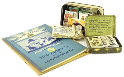 A collection of cigarette cards, coupons, Royal Family books etc.