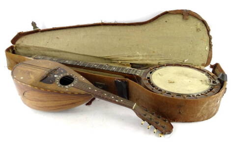 A Neapolitan mandolin, label for Ermenegildo Ferrari and an early 20thC banjo, with rosewood veneers. (AF)