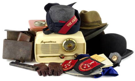 A collection of items, to include a portable radios, various hats to include Salvation Army hat, leather items etc.