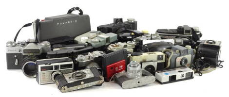 Various Polaroid, Kodak and other cameras.