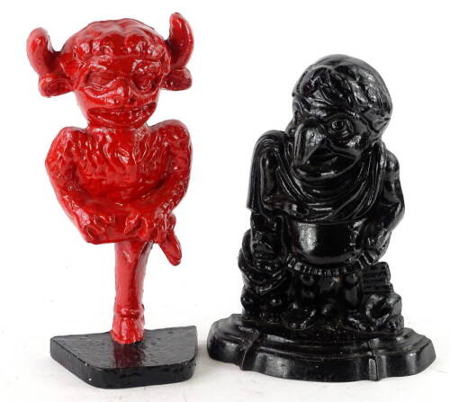 A Lincoln Imp cast iron doorstop, later painted red, 32cm H, and a Mr Punch cast iron doorstop. (2)