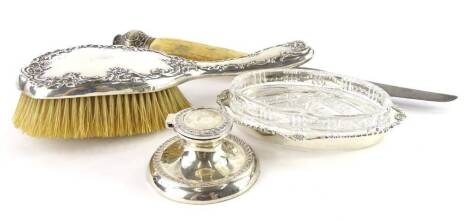 A collection of small silver and silver mounted items, to include a butter dish, an ink well, brush, etc.