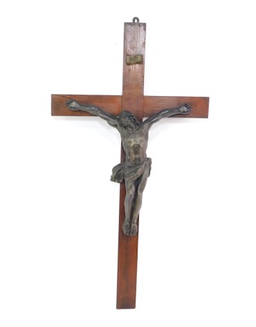 A late 19thC French crucifix, the plaster model of Christ on a wooden cross, 104cm H, 55cm W.