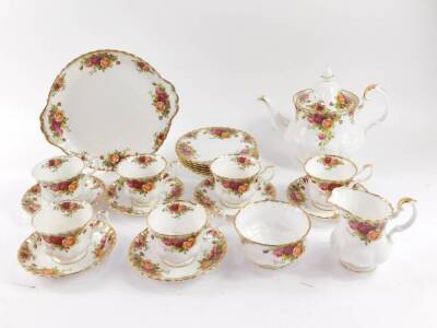 A Royal Albert porcelain part tea service, decorated in the Old Country Roses pattern, comprising teapot, bread plate, cream jug, sugar bowl, six tea cups, saucers and plates.