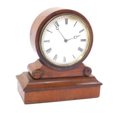 A French late 19thC walnut cased mantel clock, the circular enamel dial bearing Roman numerals, the case of barrel form, raised on a rectangular plinth, no key, 15cm W, 7.5cm D, 16.5cm H.