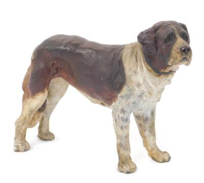 An early 20thC cold painted bronze figure of a St Bernard Dog, raised 'Foreign' mark, 18cm L.