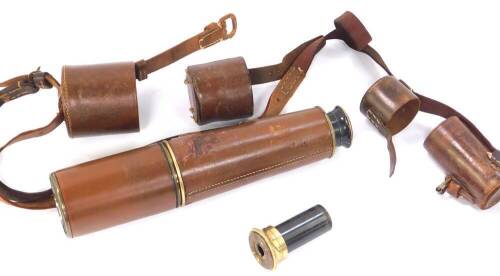 A Broadhurst Clarkson three drawer brass military signaler's telescope MKVI, leather bound, No 7593, O.S.717, G.A, with low and high eyepieces, leather cased.