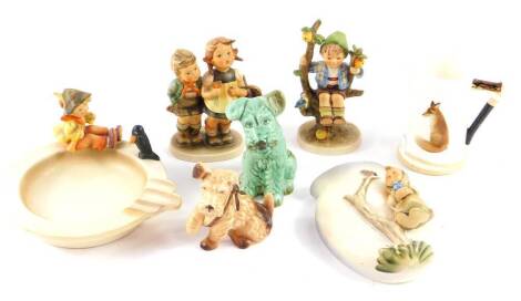 A group of Hummel, including an ashtray, Singing Lesson, To Market 49/0, Apple Tree Boy 142/I, wall pocket Apple Tree Girl, together with two Sylvac dogs, and a Royal Doulton Reynard The Fox porcelain cream jug. (7)