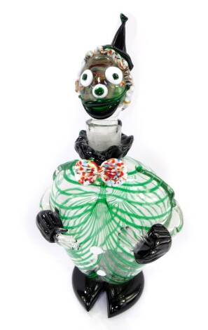 A Murano glass decanter and stopper, modelled as a clown, with green trailed decoration, modelled standing, 31cm H.