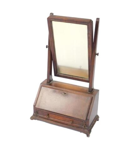 A George II walnut and burr walnut toilet mirror, the swing frame mirror over a fall flap opening to reveal two drawers and recesses, over a frieze drawer raised on bracket feet, 71.5cm H, 43cm W, 21.5cm D.