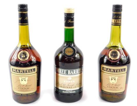 Two bottles of Martell VS Cognac, 1 litre, together with a bottle of Raynal & Seie, Three Barrels French brandy, 1 litre (3).