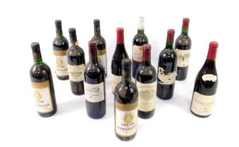 Twelve bottles of red wine, comprising Solar De Samaniego Rioja, Vino Nobile Di Montepulciano, Boi Galant Medoc 1992, Coteaux De Fontcaude, Chateau La Rouviere, Paul Pinault, Cote De Beaune Village and Chateau Fongriev-Haut Bergerac 1995.