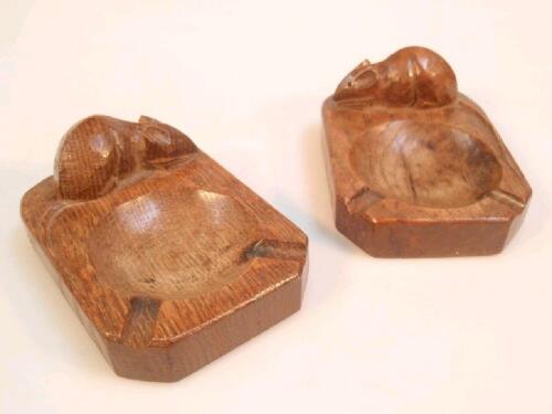 A pair of Thomson of Kilburn 'Mouseman' ash trays carved in relief with signature mouse