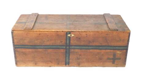 A Victorian pine trunk, with cast iron carrying handles, painted cross decoration, 53cm H, 140cm W, 60cm D.