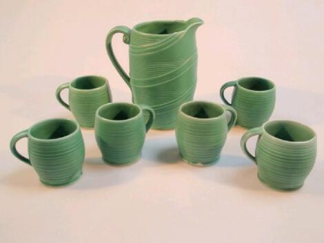 A Sylvac green glazed jug with whorl banded moulding