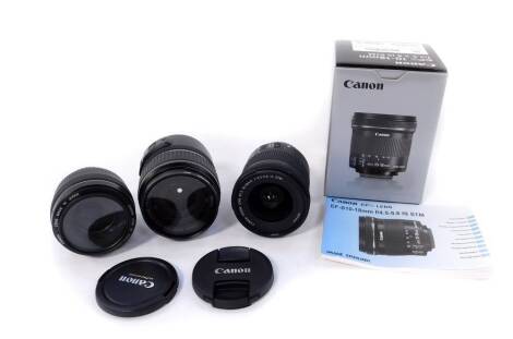 A Canon image stabiliser zoom lens, EFS10-18mm F/4.5-5.6 IS STM, boxed, together with a Canon Skylight zoom lens, EF-S 17-85mm 1:4-5.6 IS USM, and a Canon EF lens 50mm 1:1.4. (3)