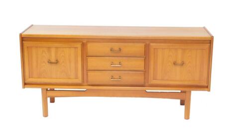 A William Lawrence of Nottingham teak sideboard, with three central drawers flanked by two cupboard doors, raised on chamfered straight legs, 77cm H, 162cm W, 44cm D.