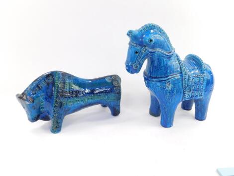 A Bitossi Rimini Blue pottery bull, c1960s, designed by Aldo Londi, 32cm L, together with a Rimini Blue pottery horse, restored, 31cm H. (2)