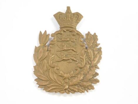 A Victorian military brass helmet plate, Duke of Wellington Regiment, Scottish Brigade, 12.5cm H.