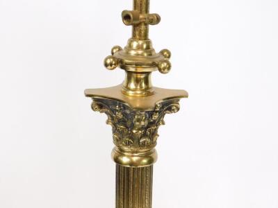 A brass Corinthian column standard lamp, raised on a stepped square base and paw and pad feet, 148cm H. - 3