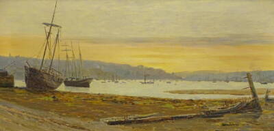 Philip Thomson Gilchrist (1865-1956). The ship graveyard at Falmouth, oil on canvas, signed and titled verso, 36.5cm x 75cm.