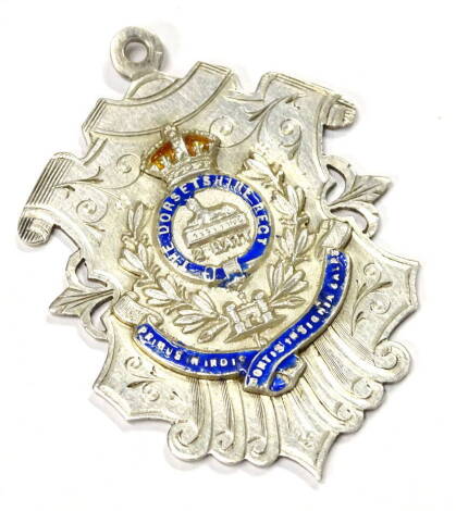 A silver Dorsetshire Regiment fob, of typical form with enamel motto, Birmingham 1912.