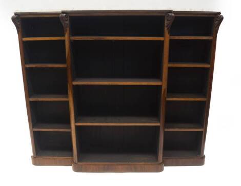 A Victorian rosewood breakfront open bookcase, with marble top, acanthus scroll to the rounded uprights, revealing adjustable shelves and plinth base, 140cm H, 171cm W, 40cm D. Provenance: The St Georges Collection, Stamford. To be sold WITHOUT RESERVE.