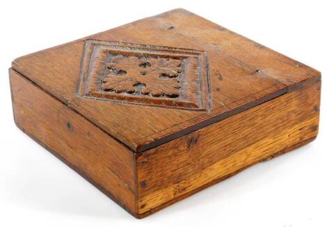 An 18thC oak salt box, of rectangular form, with a diamond and leaf emblem to the lid with plain interior, 7cm H, 20cm W, 20cm D.