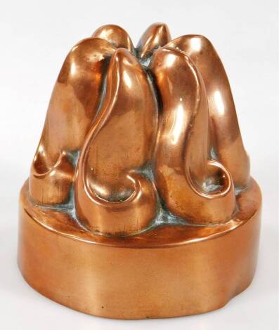 A Victorian copper jelly mould, of tapering form by Benham & Froud, numbered 486, 10cm Dia.