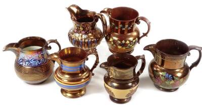 Six Victorian relief moulded copper lustre jugs, varying size and form.