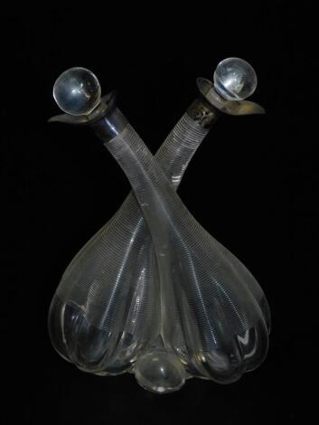 A glass oil and vinegar bottle, with silver mounts and plain spherical stoppers, 17.5cm H.