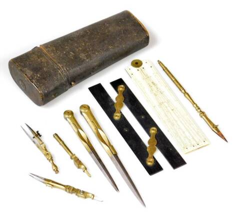 A set of 19thC drawing instruments, to include an ivory folding ruler stamped E.Halse & Sons, compass etc., in a black shagreen case, 17cm L.