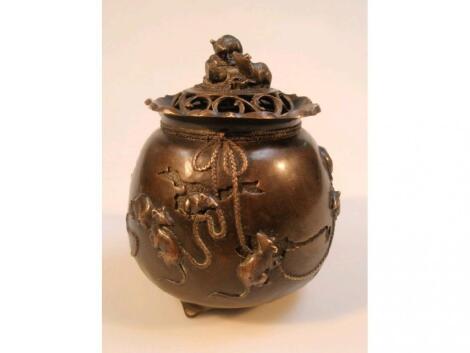 A 19thC Japanese bronze patinated censer decorated in relief with rats