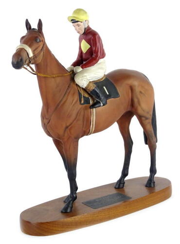 A Beswick Connoisseur model of Red Rum, Brian Fletcher Up, on rectangular wooden base with rounded corners, 34cm H.