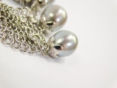 An 18ct white gold chain mail necklace, with grey baroque pearl drops, and set with small diamonds, 82.6g. - 3