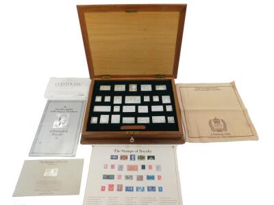 A Hallmark Replicas Limited The Stamps of Royalty silver ingot collection, cased with certificate and further paperwork.