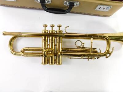 A Melody Maker brass trumpet, cased. - 3